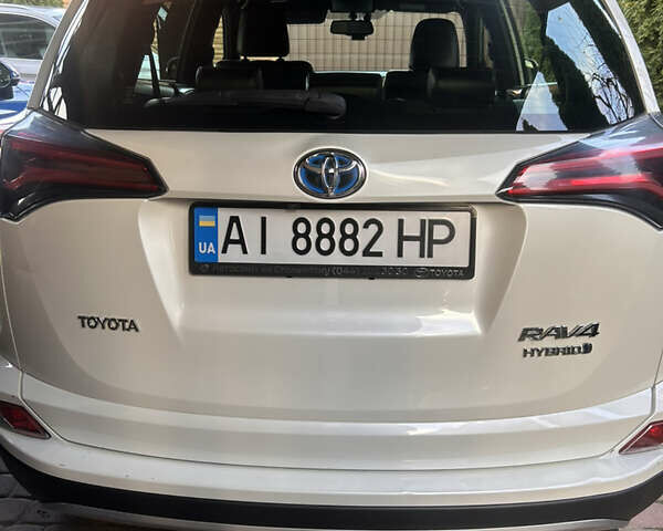 Білий Тойота РАВ 4, об'ємом двигуна 2.49 л та пробігом 146 тис. км за 24000 $, фото 4 на Automoto.ua