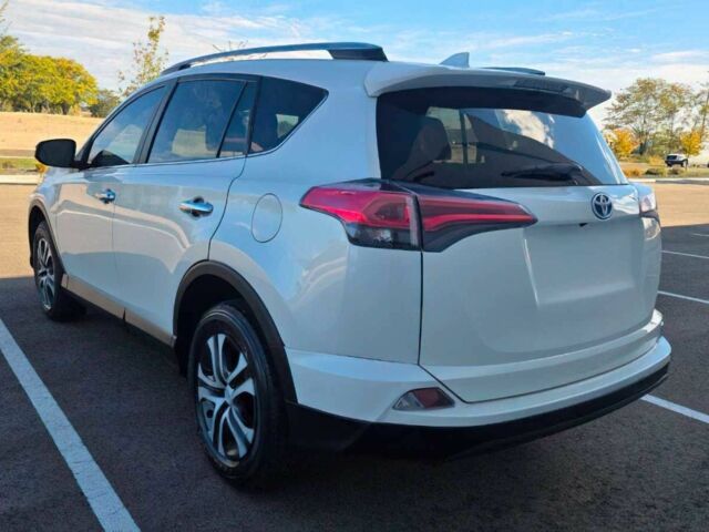 Белый Тойота РАВ 4, объемом двигателя 2.5 л и пробегом 64 тыс. км за 4500 $, фото 4 на Automoto.ua