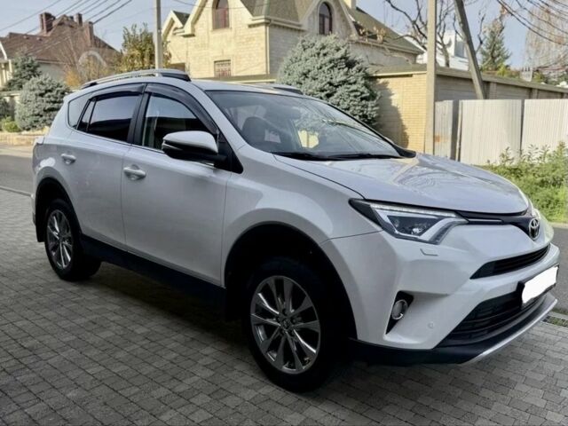 Белый Тойота РАВ 4, объемом двигателя 2.5 л и пробегом 80 тыс. км за 16000 $, фото 2 на Automoto.ua
