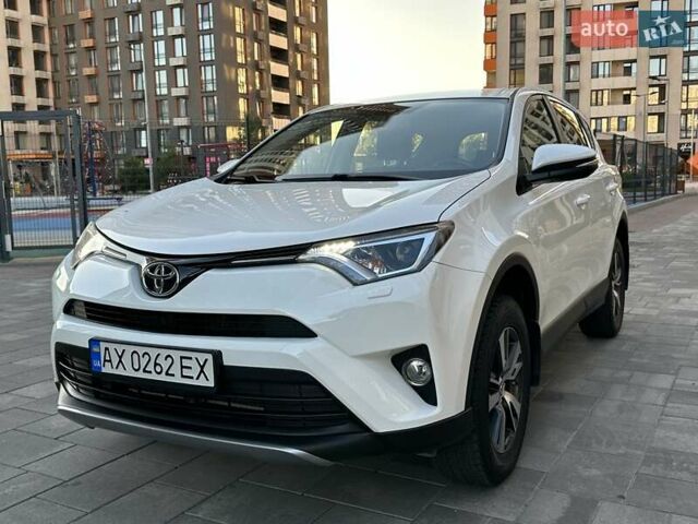 Білий Тойота РАВ 4, об'ємом двигуна 2 л та пробігом 93 тис. км за 21000 $, фото 57 на Automoto.ua