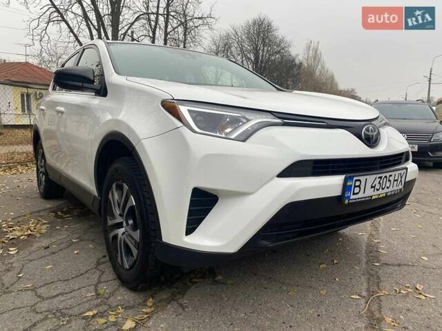 Белый Тойота РАВ 4, объемом двигателя 2.49 л и пробегом 107 тыс. км за 16950 $, фото 4 на Automoto.ua