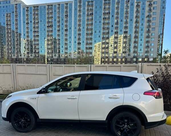 Белый Тойота РАВ 4, объемом двигателя 2.49 л и пробегом 100 тыс. км за 25999 $, фото 2 на Automoto.ua