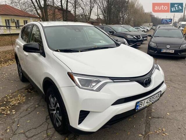 Белый Тойота РАВ 4, объемом двигателя 2.49 л и пробегом 107 тыс. км за 16950 $, фото 3 на Automoto.ua