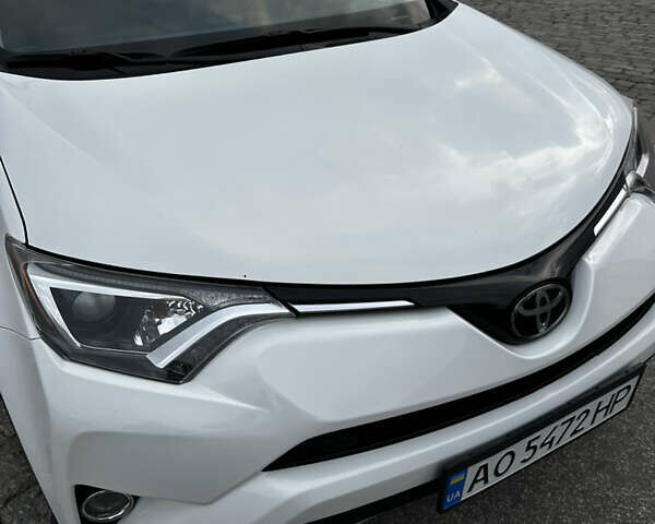 Білий Тойота РАВ 4, об'ємом двигуна 2.49 л та пробігом 163 тис. км за 18000 $, фото 24 на Automoto.ua