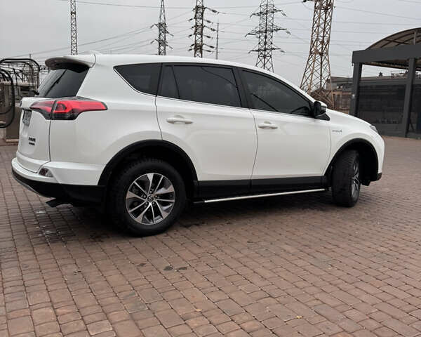 Белый Тойота РАВ 4, объемом двигателя 2.49 л и пробегом 144 тыс. км за 24990 $, фото 4 на Automoto.ua