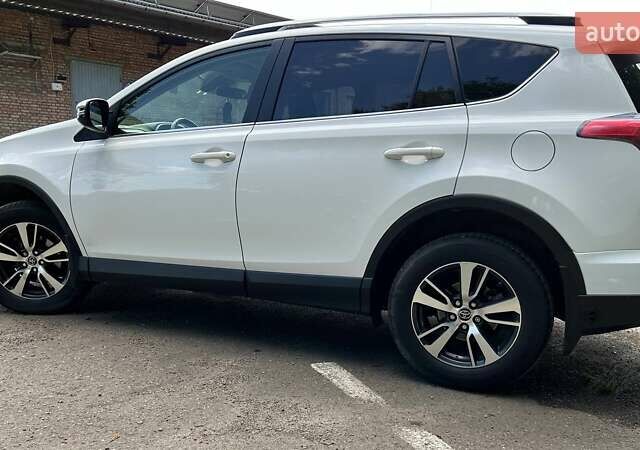 Білий Тойота РАВ 4, об'ємом двигуна 2.5 л та пробігом 115 тис. км за 19000 $, фото 3 на Automoto.ua