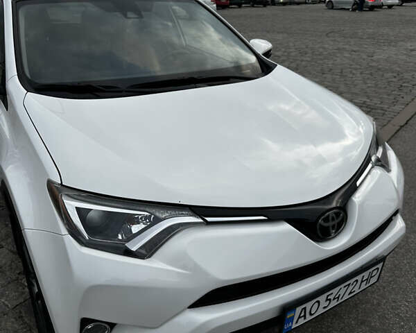 Білий Тойота РАВ 4, об'ємом двигуна 2.49 л та пробігом 163 тис. км за 18000 $, фото 23 на Automoto.ua