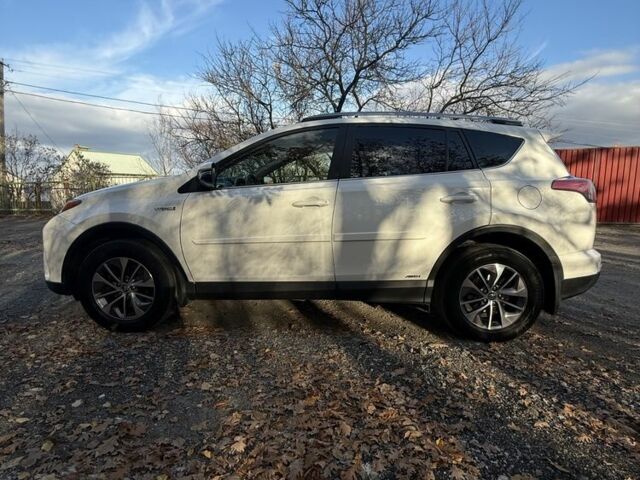 Белый Тойота РАВ 4, объемом двигателя 2.5 л и пробегом 150 тыс. км за 22500 $, фото 3 на Automoto.ua