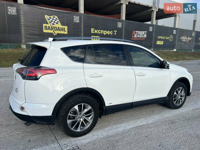 Белый Тойота РАВ 4, объемом двигателя 2.49 л и пробегом 154 тыс. км за 19400 $, фото 3 на Automoto.ua