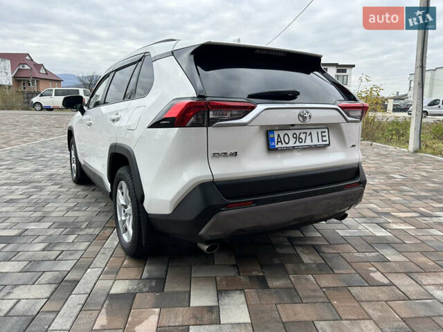 Білий Тойота РАВ 4, об'ємом двигуна 2 л та пробігом 106 тис. км за 27900 $, фото 15 на Automoto.ua