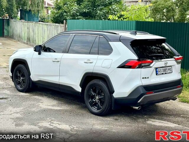 Білий Тойота РАВ 4, об'ємом двигуна 2 л та пробігом 92 тис. км за 29700 $, фото 7 на Automoto.ua