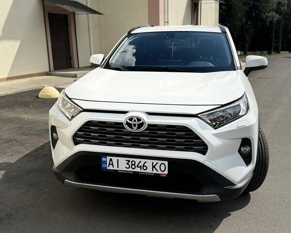 Белый Тойота РАВ 4, объемом двигателя 1.99 л и пробегом 165 тыс. км за 27000 $, фото 3 на Automoto.ua