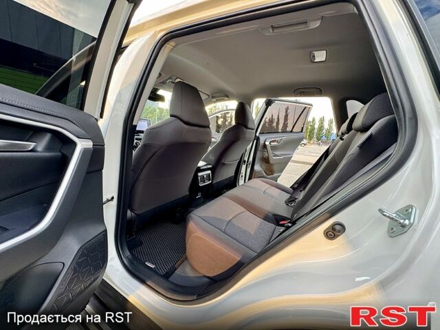 Білий Тойота РАВ 4, об'ємом двигуна 2 л та пробігом 93 тис. км за 26900 $, фото 3 на Automoto.ua