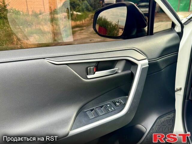 Білий Тойота РАВ 4, об'ємом двигуна 2 л та пробігом 92 тис. км за 29700 $, фото 5 на Automoto.ua