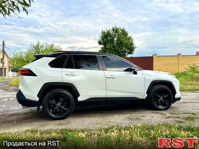 Білий Тойота РАВ 4, об'ємом двигуна 2 л та пробігом 92 тис. км за 29700 $, фото 3 на Automoto.ua