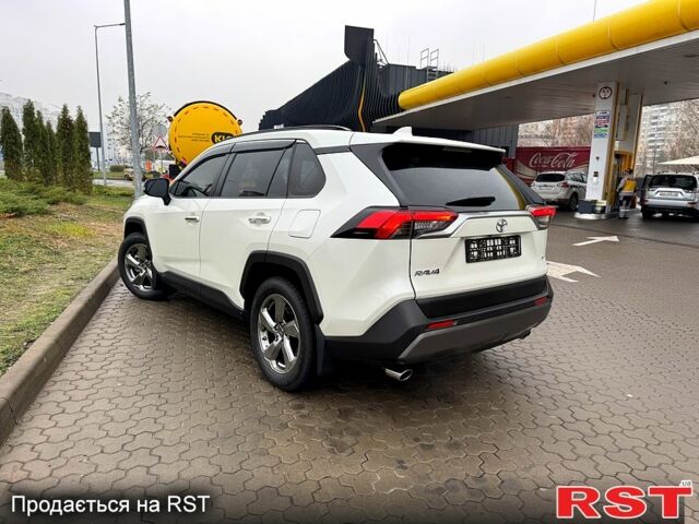 Белый Тойота РАВ 4, объемом двигателя 2 л и пробегом 99 тыс. км за 26500 $, фото 1 на Automoto.ua