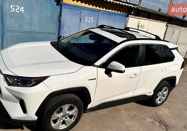 Білий Тойота РАВ 4, об'ємом двигуна 2.5 л та пробігом 121 тис. км за 27000 $, фото 2 на Automoto.ua