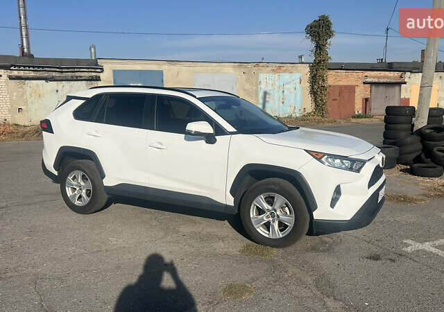 Білий Тойота РАВ 4, об'ємом двигуна 2.49 л та пробігом 75 тис. км за 28000 $, фото 13 на Automoto.ua