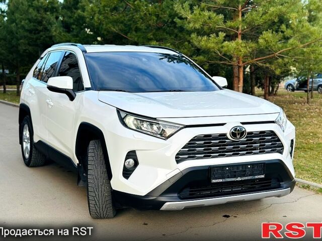 Белый Тойота РАВ 4, объемом двигателя 2 л и пробегом 155 тыс. км за 25550 $, фото 3 на Automoto.ua