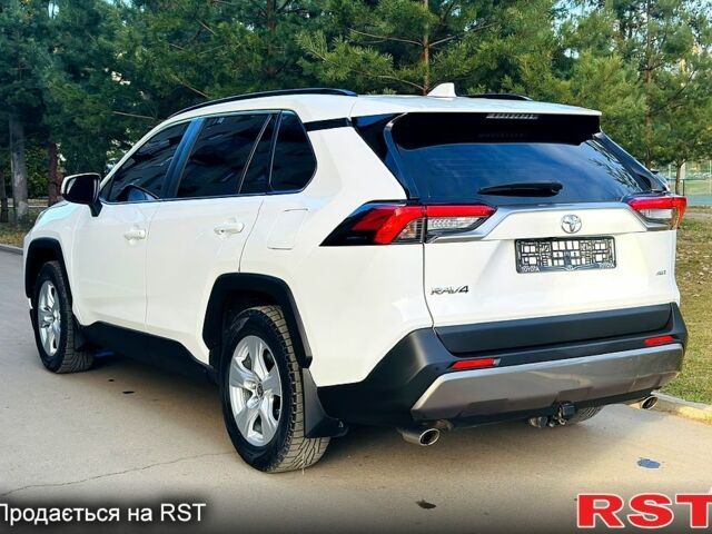 Белый Тойота РАВ 4, объемом двигателя 2 л и пробегом 155 тыс. км за 25550 $, фото 2 на Automoto.ua