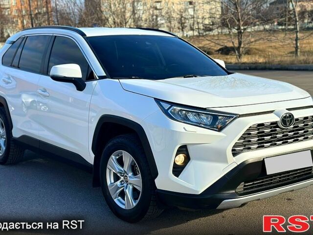 Білий Тойота РАВ 4, об'ємом двигуна 2 л та пробігом 94 тис. км за 28300 $, фото 1 на Automoto.ua