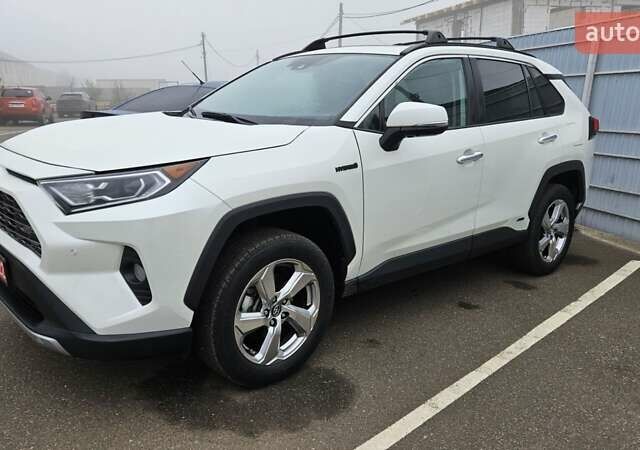 Белый Тойота РАВ 4, объемом двигателя 2.49 л и пробегом 100 тыс. км за 36500 $, фото 1 на Automoto.ua