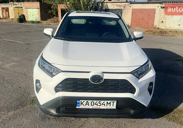 Білий Тойота РАВ 4, об'ємом двигуна 2.49 л та пробігом 75 тис. км за 28000 $, фото 1 на Automoto.ua
