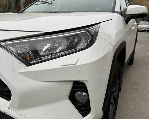 Белый Тойота РАВ 4, объемом двигателя 1.99 л и пробегом 144 тыс. км за 25000 $, фото 3 на Automoto.ua