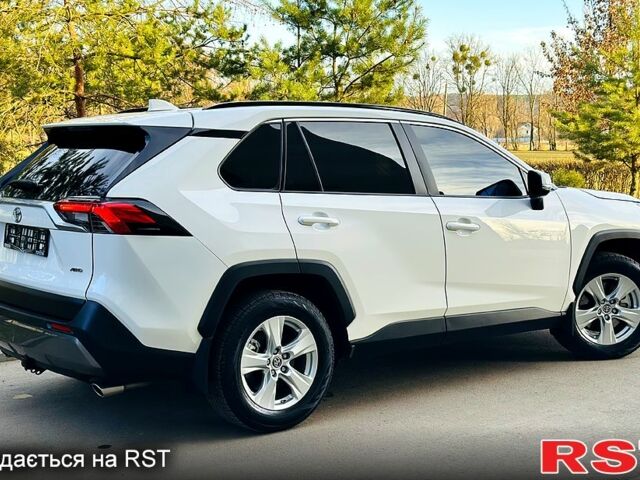 Белый Тойота РАВ 4, объемом двигателя 2 л и пробегом 155 тыс. км за 25550 $, фото 4 на Automoto.ua