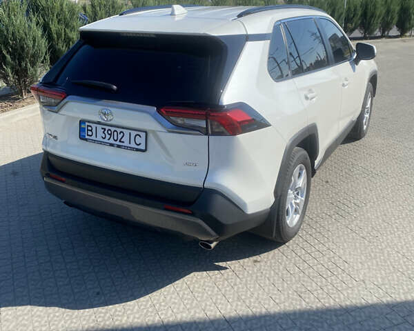 Білий Тойота РАВ 4, об'ємом двигуна 1.99 л та пробігом 61 тис. км за 34800 $, фото 2 на Automoto.ua