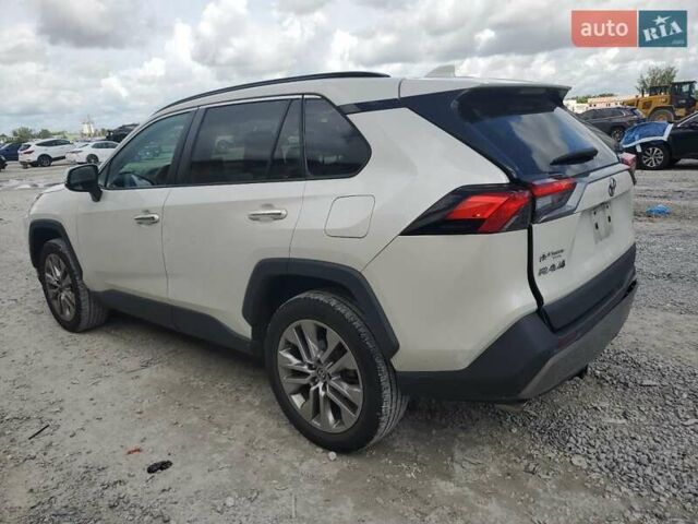 Белый Тойота РАВ 4, объемом двигателя 2.49 л и пробегом 143 тыс. км за 9000 $, фото 1 на Automoto.ua