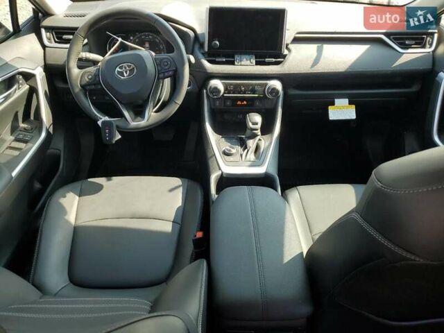 Білий Тойота РАВ 4, об'ємом двигуна 2.49 л та пробігом 70 тис. км за 12000 $, фото 7 на Automoto.ua