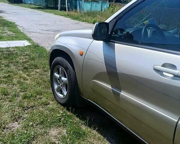 Бежевый Тойота РАВ 4, объемом двигателя 2 л и пробегом 200 тыс. км за 7800 $, фото 4 на Automoto.ua