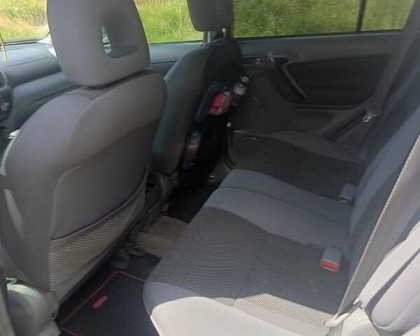 Бежевый Тойота РАВ 4, объемом двигателя 2 л и пробегом 200 тыс. км за 7800 $, фото 11 на Automoto.ua