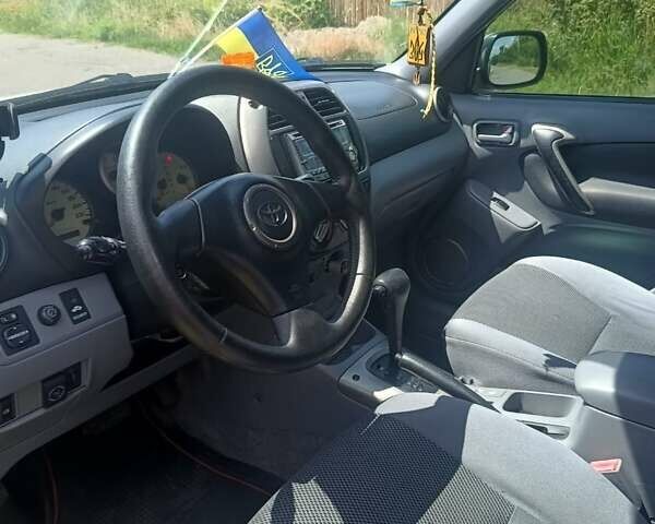 Бежевый Тойота РАВ 4, объемом двигателя 2 л и пробегом 200 тыс. км за 7800 $, фото 9 на Automoto.ua