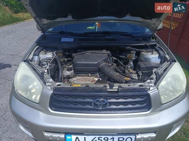 Бежевый Тойота РАВ 4, объемом двигателя 2 л и пробегом 200 тыс. км за 7800 $, фото 14 на Automoto.ua