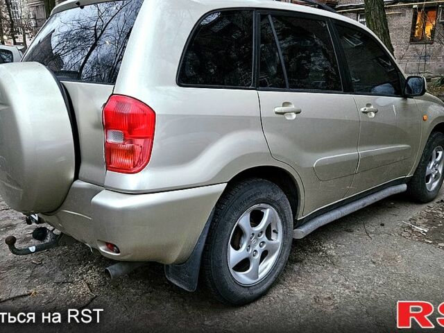 Бежевый Тойота РАВ 4, объемом двигателя 2 л и пробегом 245 тыс. км за 8000 $, фото 3 на Automoto.ua