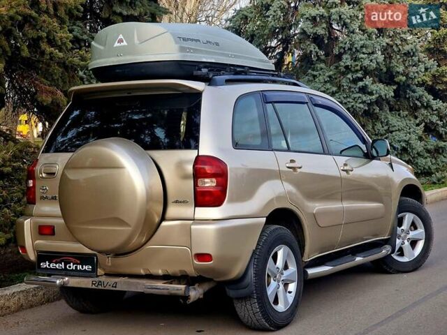 Бежевий Тойота РАВ 4, об'ємом двигуна 2.36 л та пробігом 236 тис. км за 8390 $, фото 5 на Automoto.ua