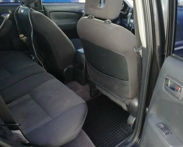 Чорний Тойота РАВ 4, об'ємом двигуна 2 л та пробігом 265 тис. км за 6699 $, фото 7 на Automoto.ua