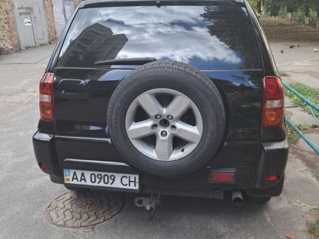 Черный Тойота РАВ 4, объемом двигателя 2 л и пробегом 319 тыс. км за 5700 $, фото 1 на Automoto.ua