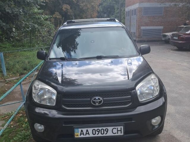 Черный Тойота РАВ 4, объемом двигателя 2 л и пробегом 319 тыс. км за 5700 $, фото 2 на Automoto.ua