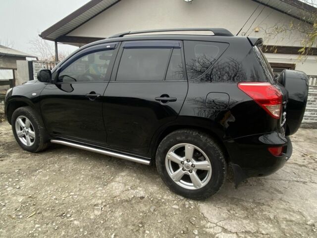 Черный Тойота РАВ 4, объемом двигателя 2 л и пробегом 218 тыс. км за 9700 $, фото 5 на Automoto.ua