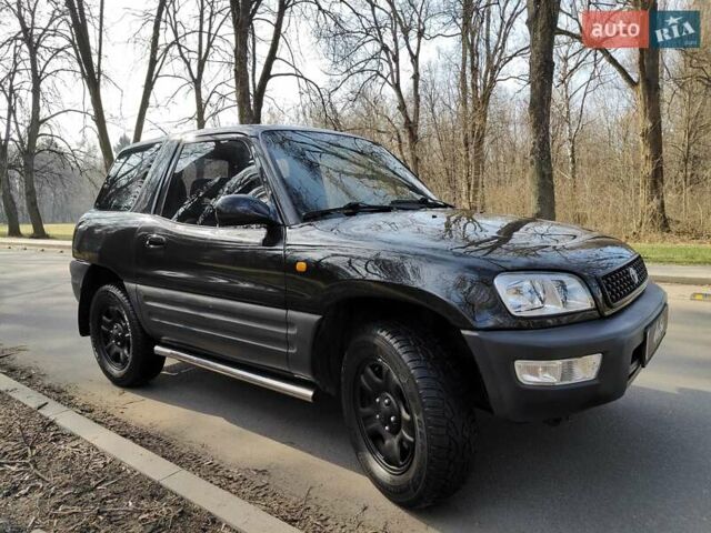 Черный Тойота РАВ 4, объемом двигателя 2 л и пробегом 250 тыс. км за 5490 $, фото 23 на Automoto.ua