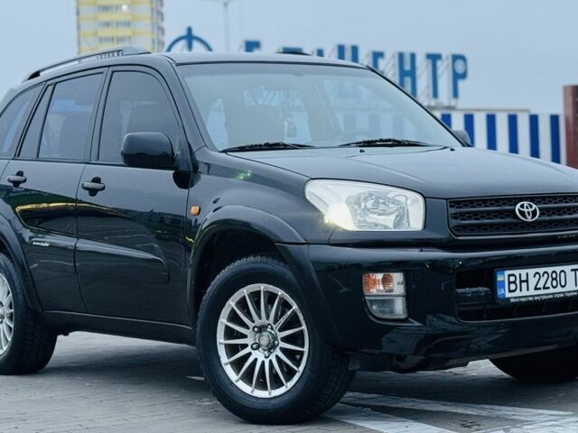 Черный Тойота РАВ 4, объемом двигателя 2 л и пробегом 205 тыс. км за 5900 $, фото 6 на Automoto.ua