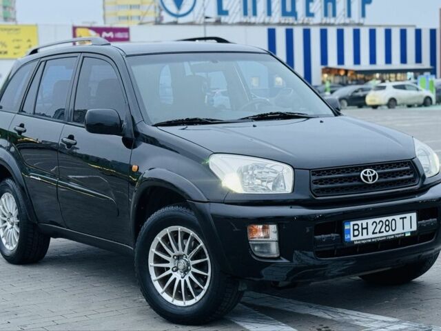 Черный Тойота РАВ 4, объемом двигателя 2 л и пробегом 205 тыс. км за 5900 $, фото 4 на Automoto.ua