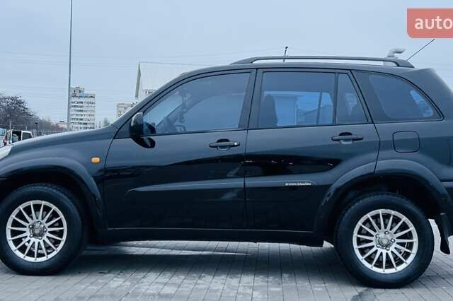 Черный Тойота РАВ 4, объемом двигателя 2 л и пробегом 205 тыс. км за 5900 $, фото 10 на Automoto.ua