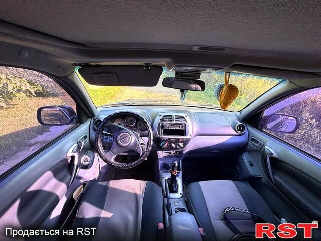 Чорний Тойота РАВ 4, об'ємом двигуна 2 л та пробігом 493 тис. км за 4999 $, фото 3 на Automoto.ua