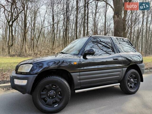 Черный Тойота РАВ 4, объемом двигателя 2 л и пробегом 250 тыс. км за 5490 $, фото 3 на Automoto.ua