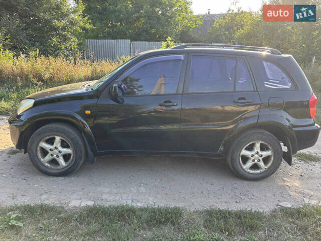 Черный Тойота РАВ 4, объемом двигателя 2 л и пробегом 493 тыс. км за 5500 $, фото 3 на Automoto.ua