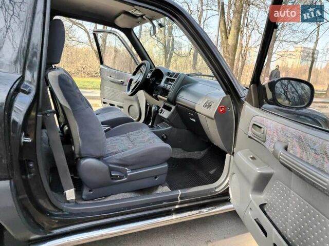Черный Тойота РАВ 4, объемом двигателя 2 л и пробегом 250 тыс. км за 5490 $, фото 22 на Automoto.ua
